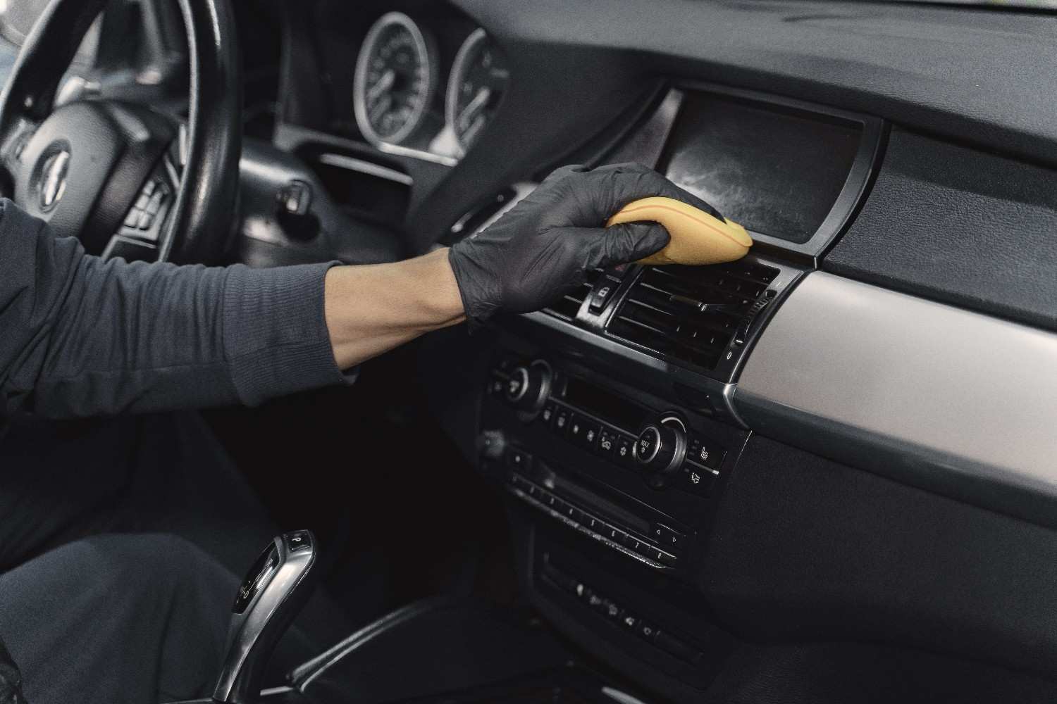man-polish-salon-car-garage